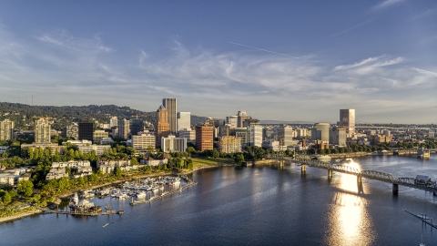 DXP001_010_0016 - Aerial stock photo of The Willamette River with a view of the city's skyline and the Hawthorne Bridge in Downtown Portland, Oregon