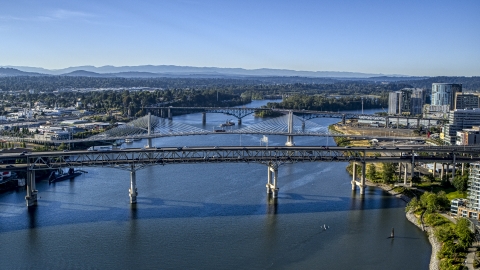 DXP001_011_0002 - Aerial stock photo of Bridges spanning the Willamette River in South Portland, Oregon