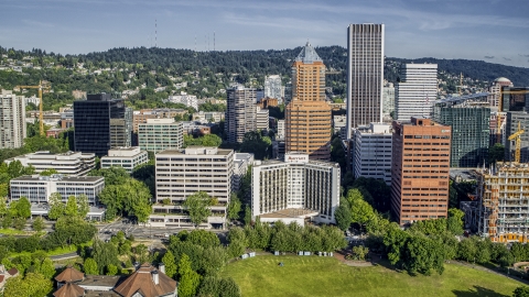 DXP001_011_0007 - Aerial stock photo of Hotel surrounded by office buildings and tall skyscrapers in Downtown Portland, Oregon