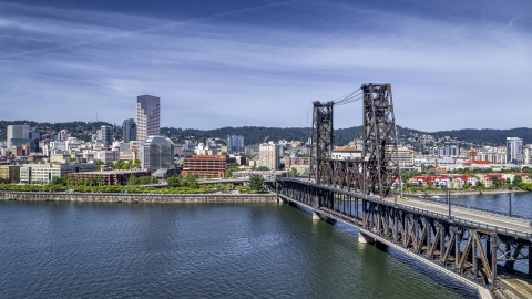 DXP001_012_0001 - Aerial stock photo of Steel Bridge and waterfront buildings in Downtown Portland, Oregon