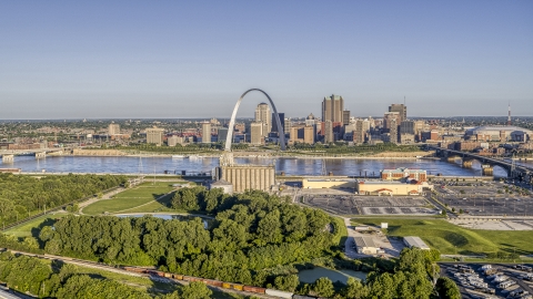 A park and grain elevator by the river with views of the Arch and skyline, Downtown St. Louis, Missouri Aerial Stock Photos | DXP001_022_0002