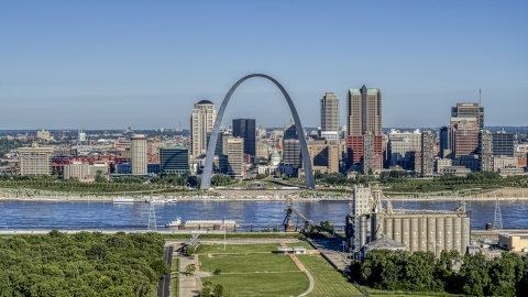 The Mississippi River and Gateway Arch by the skyline, Downtown St. Louis, Missouri Aerial Stock Photos | DXP001_023_0001