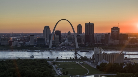 Downtown St. Louis, Missouri skyline and the Gateway Arch across the river at sunset Aerial Stock Photos | DXP001_029_0004