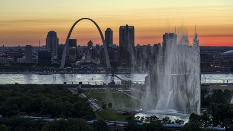 The Gateway Geyser and Arch, Downtown St. Louis, Missouri, twilight Aerial Stock Photos | DXP001_030_0001