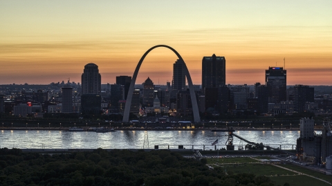 A view across the river at Downtown St. Louis, Missouri, twilight Aerial Stock Photos | DXP001_030_0004