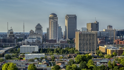 DXP001_033_0005 - Aerial stock photo of Tall skyscrapers beyond an office building in Downtown St. Louis, Missouri