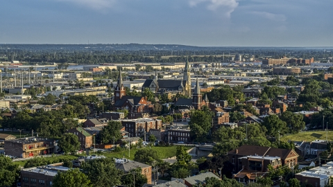 DXP001_033_0010 - Aerial stock photo of A view of three brick churches in St. Louis, Missouri