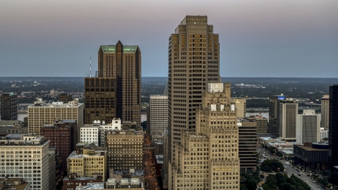 DXP001_036_0009 - Aerial stock photo of Towering skyscrapers at twilight in Downtown St. Louis, Missouri