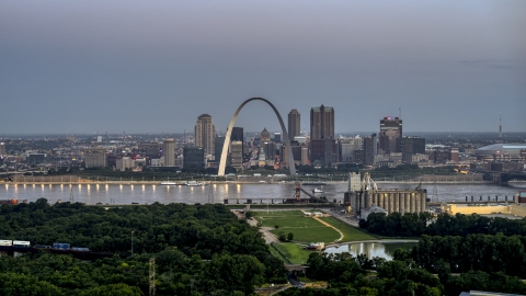 The Gateway Arch and the Mississippi River at twilight, Downtown St. Louis, Missouri Aerial Stock Photos | DXP001_037_0013