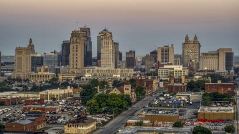 DXP001_039_0004 - Aerial stock photo of The city's tall skyscrapers at sunrise in Downtown Kansas City, Missouri