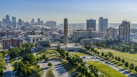 DXP001_043_0005 - Aerial stock photo of The WWI memorial in Kansas City, Missouri, with a view of the downtown skyline