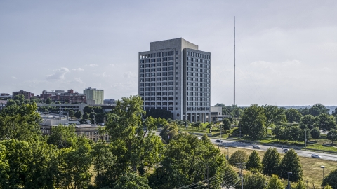 A government office building seen from trees in Kansas City, Missouri Aerial Stock Photos | DXP001_044_0010