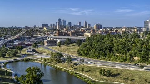 DXP001_045_0001 - Aerial stock photo of The city's skyline seen from a small lake, Kansas City, Missouri