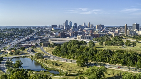 DXP001_045_0004 - Aerial stock photo of The city skyline seen from a small lake by Broadway Boulevard, Downtown Kansas City, Missouri