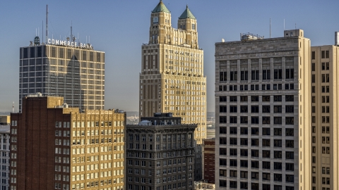 DXP001_048_0002 - Aerial stock photo of 909 Walnut skyscraper between two neighboring skyscrapers in Downtown Kansas City, Missouri