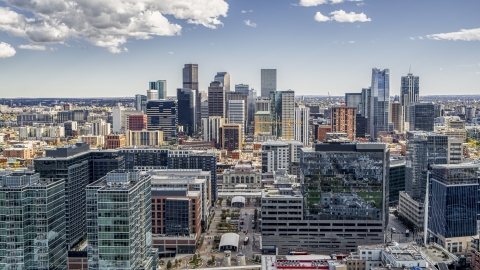 DXP001_055_0004 - Aerial stock photo of The city's skyline behind office buildings in Downtown Denver, Colorado