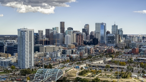 DXP001_055_0011 - Aerial stock photo of The city's skyline and a residential skyscraper in Downtown Denver, Colorado