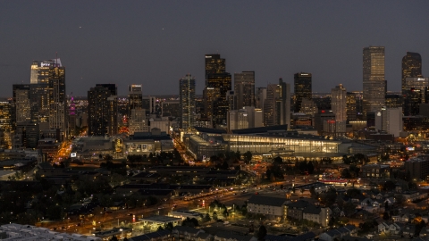 DXP001_057_0007 - Aerial stock photo of The city's skyline behind the convention center at twilight, Downtown Denver, Colorado