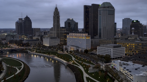 DXP001_087_0008 - Aerial stock photo of The Scioto River and city skyline at twilight, Downtown Columbus, Ohio