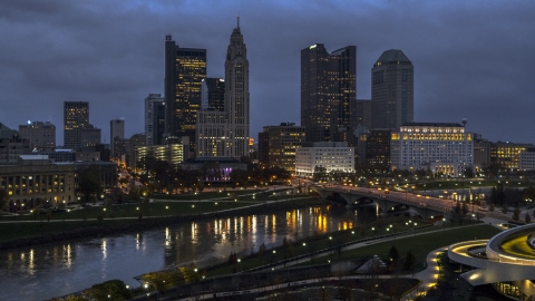 DXP001_088_0001 - Aerial stock photo of The city skyline across the river at twilight, Downtown Columbus, Ohio