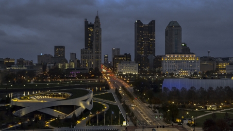 DXP001_088_0003 - Aerial stock photo of The city skyline across the bridge and river at twilight, Downtown Columbus, Ohio