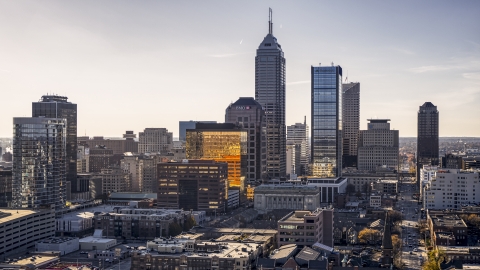 A view of towering skyscrapers in the city's skyline in Downtown Indianapolis, Indiana Aerial Stock Photos | DXP001_090_0012