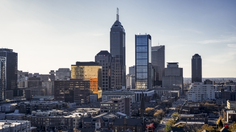 Giant skyscrapers and city buildings in the city's skyline in Downtown Indianapolis, Indiana Aerial Stock Photos | DXP001_090_0016