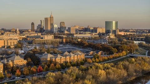 DXP001_092_0005 - Aerial stock photo of The city's skyline seen from the White River at sunset, Downtown Indianapolis, Indiana