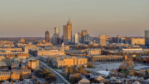 A wide view of the city's downtown skyline at sunset, Downtown Indianapolis, Indiana Aerial Stock Photos | DXP001_092_0011