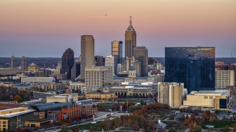 Hotel and city's skyline at sunset, Downtown Indianapolis, Indiana Aerial Stock Photos | DXP001_092_0015