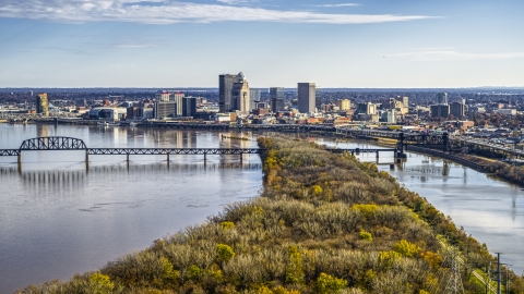 DXP001_094_0010 - Aerial stock photo of The city's skyline beside the river in Downtown Louisville, Kentucky