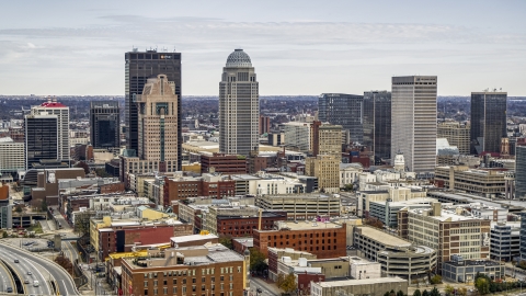 City skyline seen from brick buildings in Downtown Louisville, Kentucky Aerial Stock Photos | DXP001_095_0001