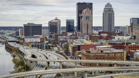 DXP001_095_0005 - Aerial stock photo of The city's skyline seen from an offramp in Downtown Louisville, Kentucky