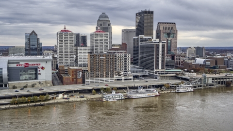 Hotel and skyline seen from the river in Downtown Louisville, Kentucky Aerial Stock Photos | DXP001_095_0010