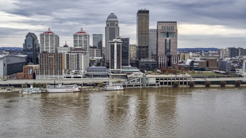 The downtown skyline seen from the river in Downtown Louisville, Kentucky Aerial Stock Photos | DXP001_095_0011