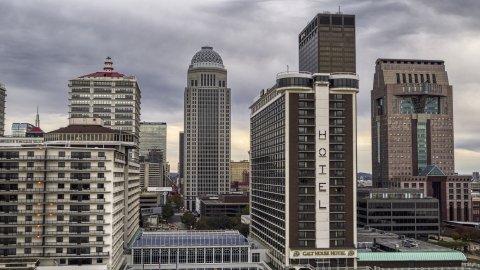 DXP001_095_0015 - Aerial stock photo of High-rise hotel with skyscrapers in background, Downtown Louisville, Kentucky