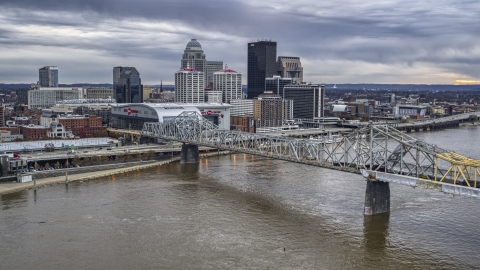 DXP001_096_0002 - Aerial stock photo of The city's skyline at twilight, seen from Ohio River, Downtown Louisville, Kentucky