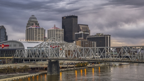 The downtown skyline lit up at twilight, seen from Ohio River, Downtown Louisville, Kentucky Aerial Stock Photos | DXP001_096_0004