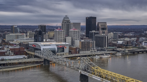 The city's skyline at twilight, seen from Ohio River, Downtown Louisville, Kentucky Aerial Stock Photos | DXP001_096_0005