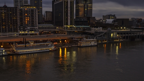 DXP001_096_0008 - Aerial stock photo of A view of the city's skyline at night, seen from Ohio River, Downtown Louisville, Kentucky