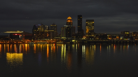 DXP001_096_0018 - Aerial stock photo of A view across the Ohio River toward the city skyline at twilight, Downtown Louisville, Kentucky