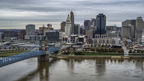 DXP001_097_0003 - Aerial stock photo of The bridge and river with view of city skyline, Downtown Cincinnati, Ohio