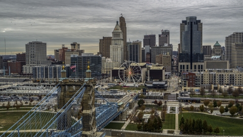 DXP001_097_0005 - Aerial stock photo of A view of the city skyline from the Roebling Bridge over the Ohio River, Downtown Cincinnati, Ohio