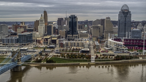 DXP001_097_0006 - Aerial stock photo of The Ferris wheel and city skyline seen from the Ohio River, Downtown Cincinnati, Ohio