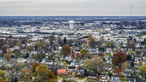 A water tower surrounded by warehouse buildings in Lexington, Kentucky Aerial Stock Photos | DXP001_099_0016