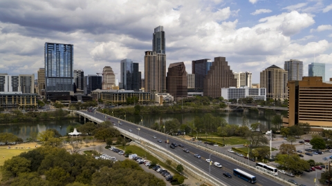 DXP002_102_0003 - Aerial stock photo of A view of the city's skyline from First Street Bridge and Lady Bird Lake, Downtown Austin, Texas