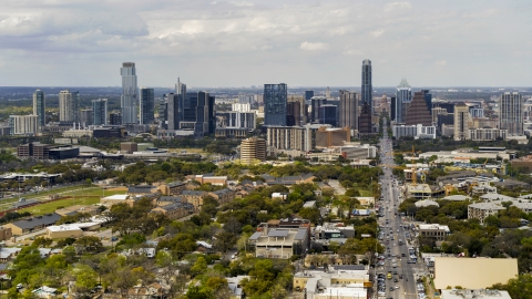 DXP002_103_0011 - Aerial stock photo of A wide view of the city's skyline from Congress Avenue in Downtown Austin, Texas