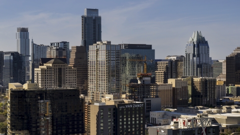 DXP002_108_0009 - Aerial stock photo of The Austonian skyscraper by a high-rise hotel in Downtown Austin, Texas