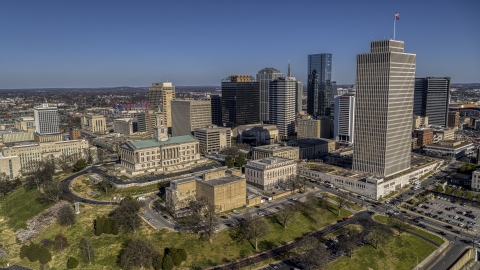 A view of the Tennessee State Capitol, skyscrapers, and Tennessee Tower in Downtown Nashville, Tennessee Aerial Stock Photos | DXP002_114_0004