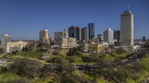 The Tennessee State Capitol near tall skyscrapers in Downtown Nashville, Tennessee Aerial Stock Photos | DXP002_114_0005